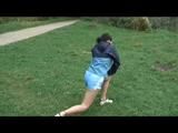 Enni during stretching wearing shiny nylon shorts and an oldschool rain jacket (Video)