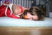 Kathi hogtied topless and in her tight lycra