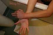 Stella tied and gagged with ropes and a cloth gag in a bath tub wearing ONLY a sexy black shiny nylon shorts (Pics)