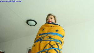 Angel tied up in blankets