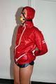 Alina tied and gagged in shiny nylon shorts and a shiny nylon cagoule