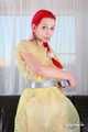 Morrigan - posing in yellow trash bag dress