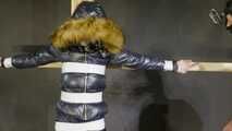 Lana tied and gagged in a shiny nylon Downjacket