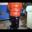 Mara sorting newspapers and lolling on the floor and the sofa wearing sexy shiny nylon downwear (Video)