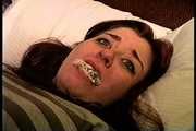 23 YR OLD REAL ESTATE BROKER IS MOUTH STUFFED WITH A SPONGE, WRAP TAPE GAGGED, GAG TALKING, RAG STUFFED IN MOUTH AND TIGHTLY HANDGAGGED  (D74-15)