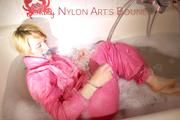 Sonja ties and gagges herself in the bath tub with cuffs wearing sexy shiny nylon downwear (Pics)