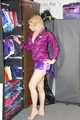 Pia enjoying a cupboard full of shiny nylon clothes trying on purple shiny nylon shorts and rain jacket (Pics)
