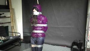 Aiyana bound, gagged, vibed and satisfied :) in a shiny nylon Downjacket