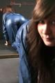 Alina posing in a studio wearing a supersexy blue rainwear combination (Pics)