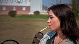 answering questions while smoking 120mm Saratoga cigarette