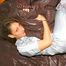 Stella lolling on bed and posing outdoor wearing sexy shiny nylon rainwear jumpsuit (Pics)