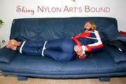 Beautiful archive girl tied and gagged wearing an wonderful oldschool shiny downwear (Pics)