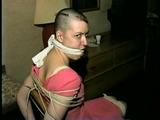 PUNK MELA IS BAREFOOT,MOUTH STUFFED, CLEAVE GAGGED, TOE-TIED & TRIES TO MAKE PHONE CALL (D43-11)
