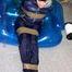 Jill tied and gagged in a shiny nylon down jacket 