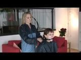 03:40 Min. video with Nicole tied and gagged in shiny nylon rainwear