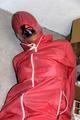 Simone tied by Jill in shiny nylon rainwear