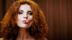 Wild and free girl Yuliya is definitely enjoying a strong 100mm black cigarette