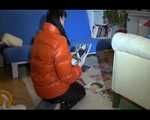 Mara sorting newspapers and lolling on the floor and the sofa wearing sexy shiny nylon downwear (Video)