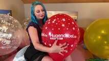 nail2pop big balloons on bed