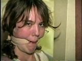 SWEET SHY HEATHER IS MOUTH STUFFED, ACE BANDAGE CLEAVE GAGGED, BAREFOOT, TOES TIED AND BOUND TO A CHAIR (D46-13)
