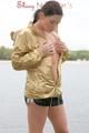 Enni having a good time outdoor wearing sexy shiny nylon shorts and a top posing for the camera (Pics)