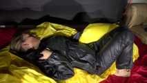 Sexy Sandra wearing sexy shiny nylon rainwear lolling in bed of nylon (Pics)