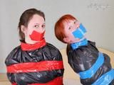 [From archive] Liska and Miss Love packed in trash bags together