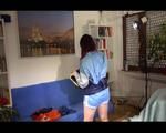 Jill folding shiny nylon clothes wearing shiny nylon clothes (Video) 