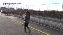 078014 Rachel Evans Pees Beside Her Car