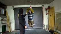 Rachel Adams bound, gagged and suspended in shiny nylon Down