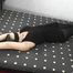 Laura lying on bed 2/2