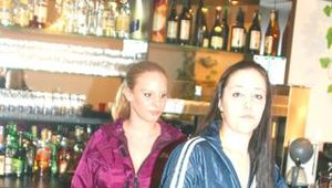 Two archive girls wearing shiny nylon rainwear and having fun with eachother in a club (Pics)