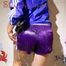 Sonja wearing a sexy purple shiny nylon shorts and a blue rain jacket while taking a shower (Pics)