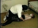 TAPE WRAPPING UP A LITTLE DOLL (D10-2)