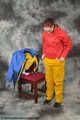 Bound in layers of raingear