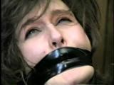 ERICA IS MOUTH STUFFED, WRAP TAPE GAGGED & BALL-TIED (D29-8)