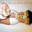 An archive girl tied, gagged and blind folded on a bed wearing only a white shiny nylon shorts (Pics)