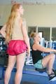 Katharina and Jenny during their workout in the fitness center wearing sexy shiny nylon shorts and tops (Pics)