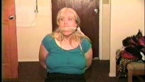 50 Yr OLD REAL ESTATE AGENT GETS HER MOUTH STUFFED, CLEAVE GAGGED & TIED TO A CHAIR (D62-7)