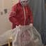 Lady Nadja in layers of AGU rainwear and and transparent raincoat