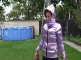 Watch Sandra taking a shower in her new purple shiny nylon down jacket 