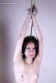 Tracy: topless barefoot girl with noose on her neck, having her to stand on her tip toes to breathe, is tickled by camera man