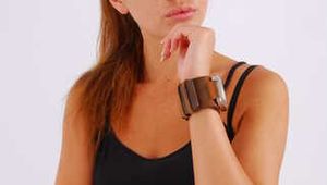 Evita wearing a huge OOZOO cuff watch 