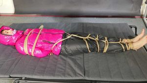 A custom Video with Myxxxy bound, gagged and vibed in a shiny nylon downjacket