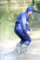 Stella jumping in puddles wearing sexy blue shiny nylon rainwear and rubber boots (Pics)