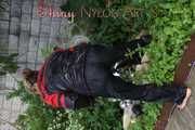 Watching sexy Sandra wearing a oldschool black/red shiny nylon rainwear combination while gardening outside (Pics)