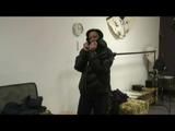 Stella posing infront of the camera wearing supersexy black rainwear and highheels (Video)
