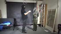 Ms Ungeniert tied and gagged in shiny nylon Rainwear 