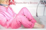 Sonja ties and gagges herself in the bath tub with cuffs wearing sexy shiny nylon downwear (Pics)