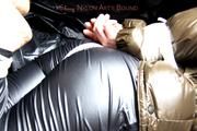 Jill tied and gagged in a shiny nylon down coat
